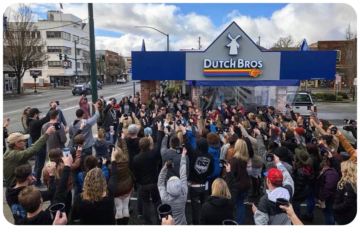 group of broistas in front of a dutch bros stand