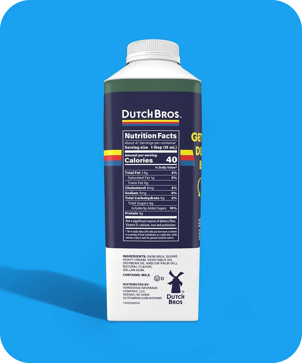 Dutch Bros coffee creamer bottle with nutrition facts label on navy blue packaging against bright blue background.