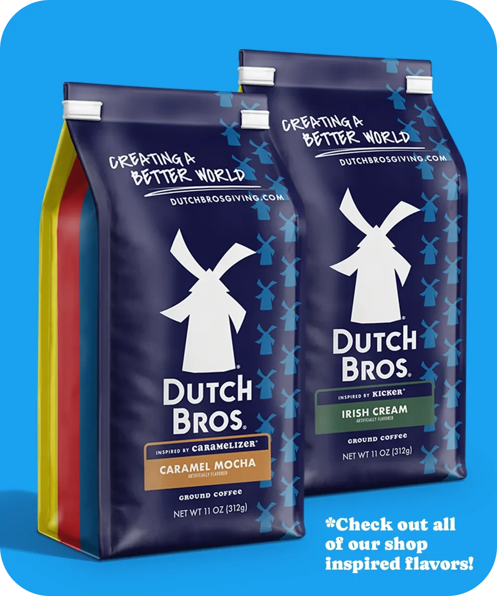 Two bags of Dutch Bros coffee in Caramel Mocha and Irish Cream flavors against a blue background.