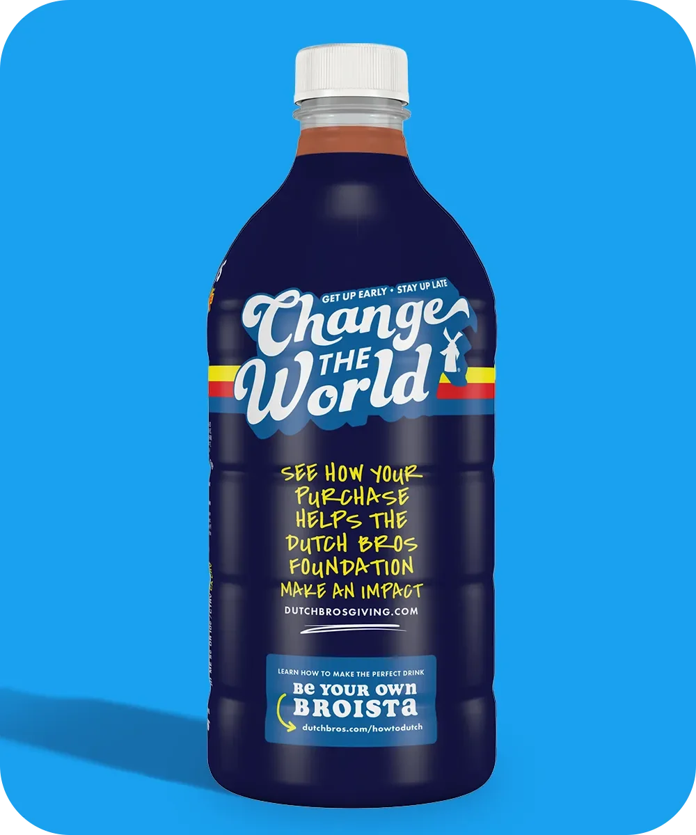Dark blue Dutch Bros coffee bottle with "Change the World" slogan against bright blue background.