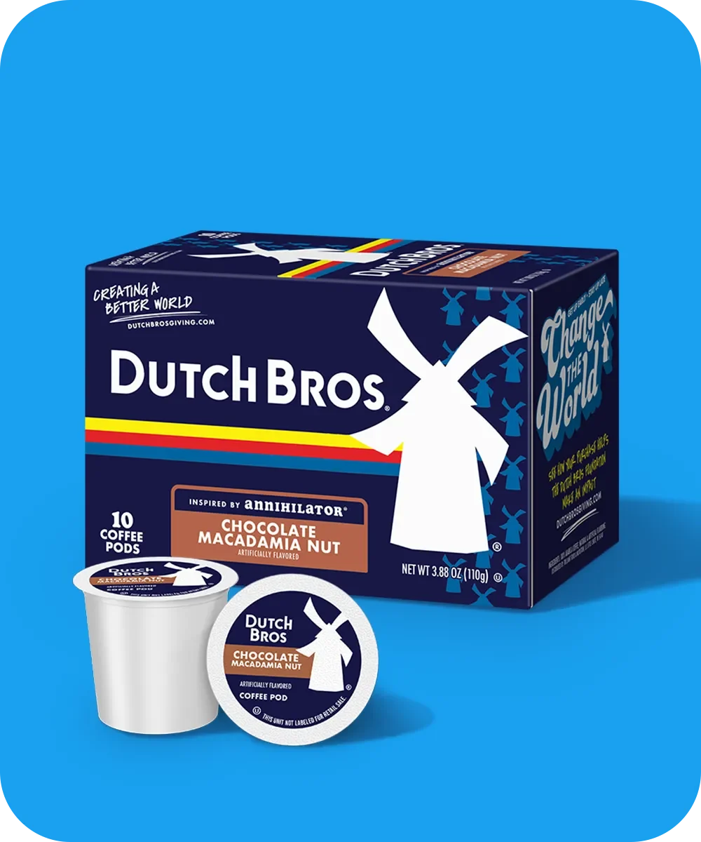 Dutch Bros box of Chocolate Macadamia Nut coffee pods with two single-serve pods displayed against blue background.