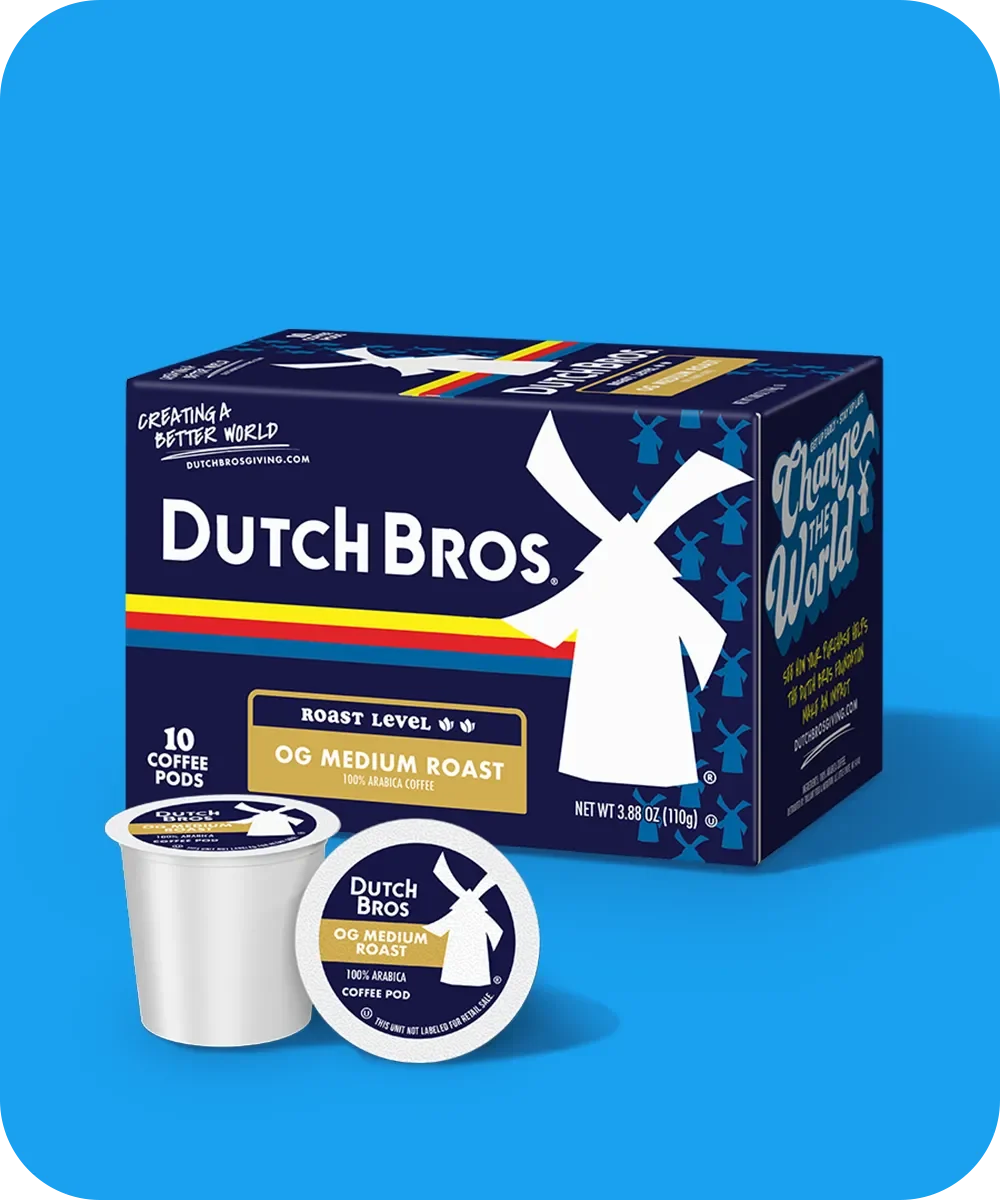 Dutch Bros OG Medium Roast coffee box with 10 coffee pods, featuring windmill logo on blue background.