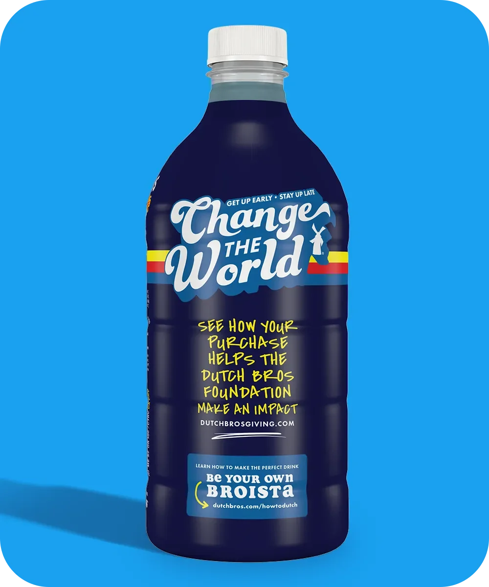 Dark blue Dutch Bros bottle with "Change the World" slogan and foundation information on a bright blue background.