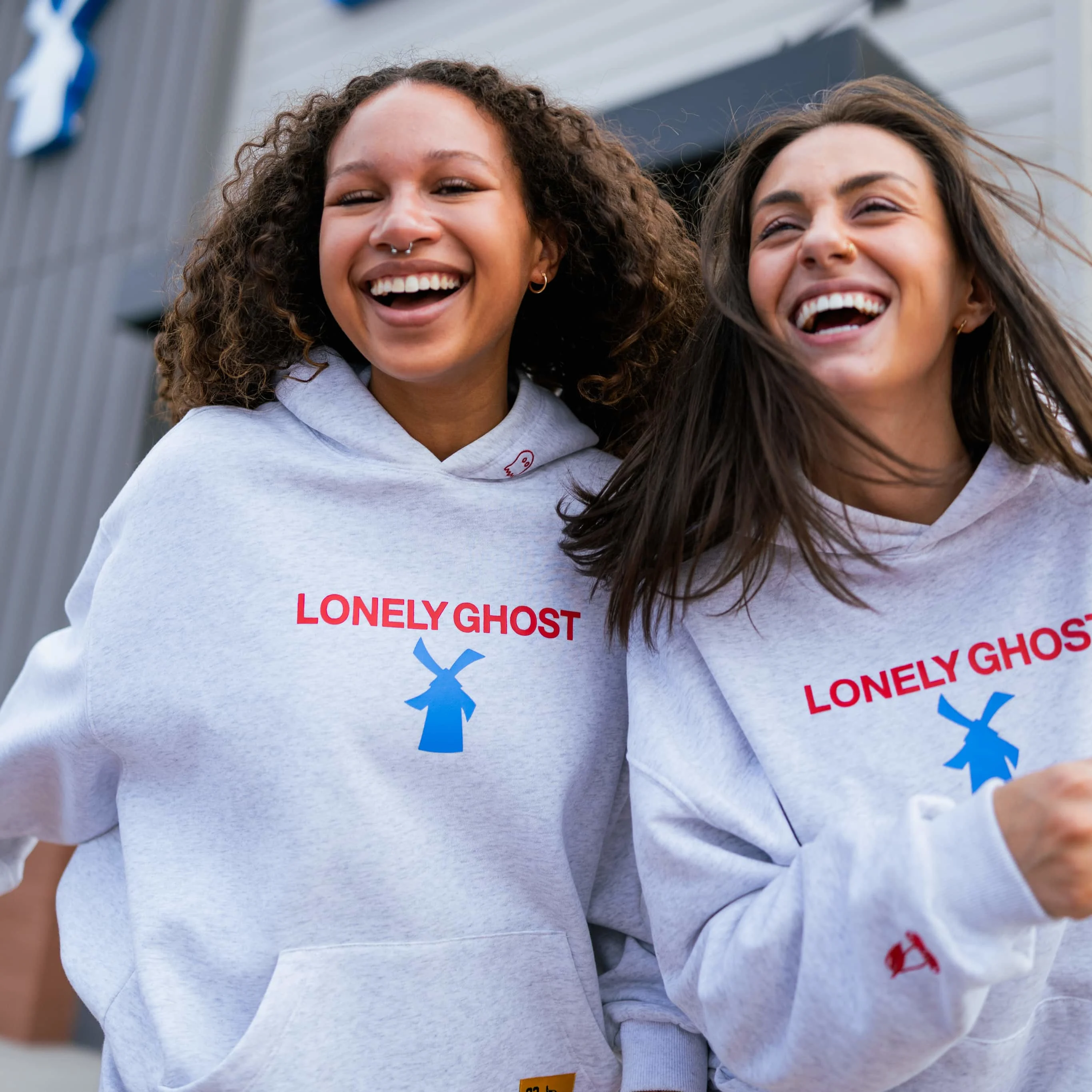 dutch bros broistas wearing lonely ghost dutch bros collab hoodies