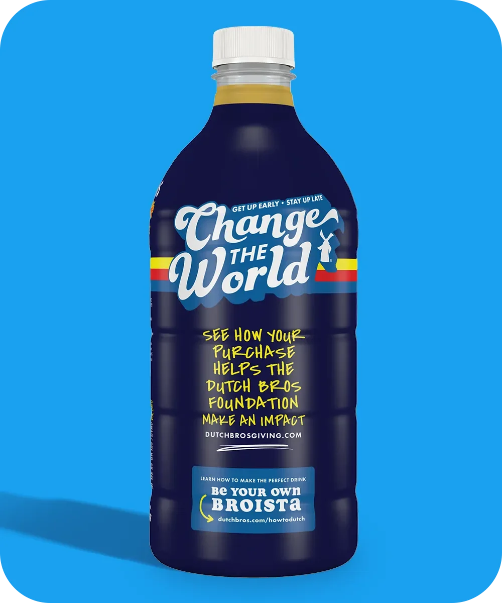 Dark blue Dutch Bros bottle with "Change The World" slogan and colorful stripes against bright blue background.