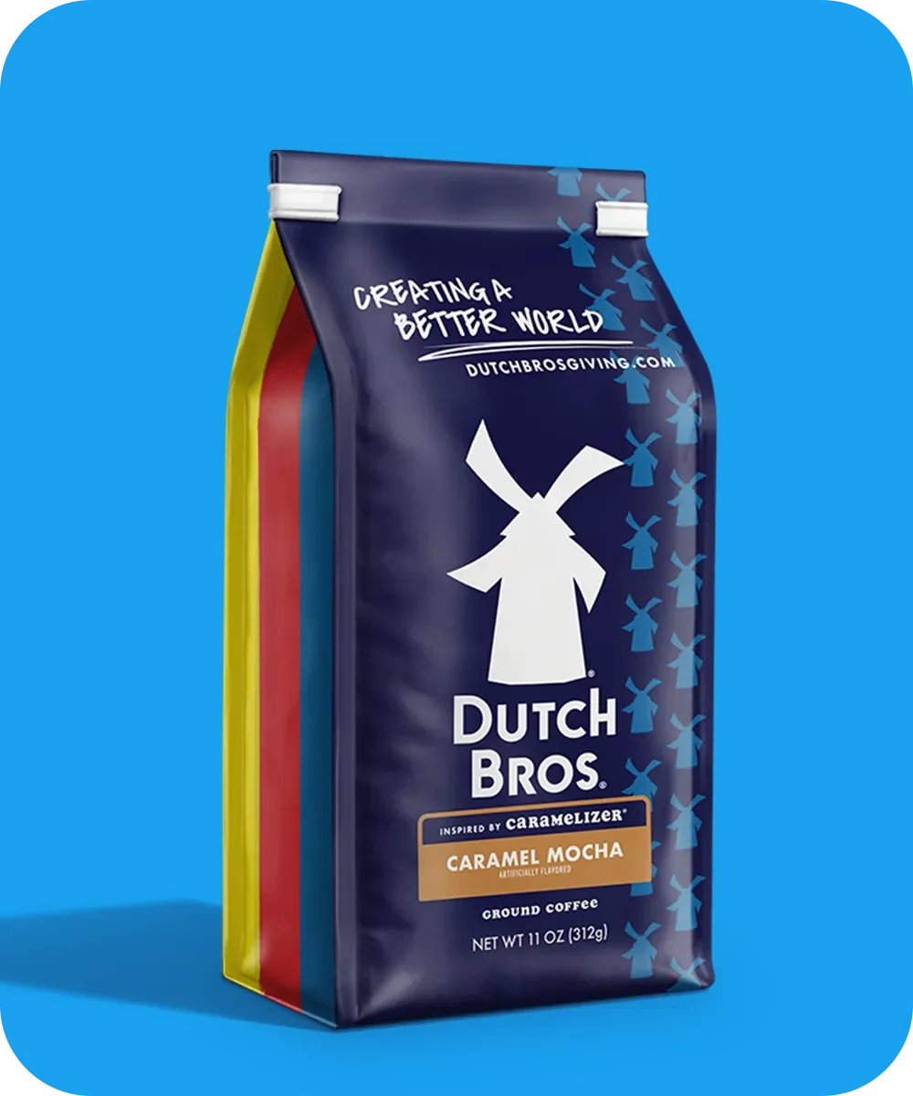 Dutch Bros Caramel Mocha coffee bag with windmill logo on blue background, 11 oz ground coffee.