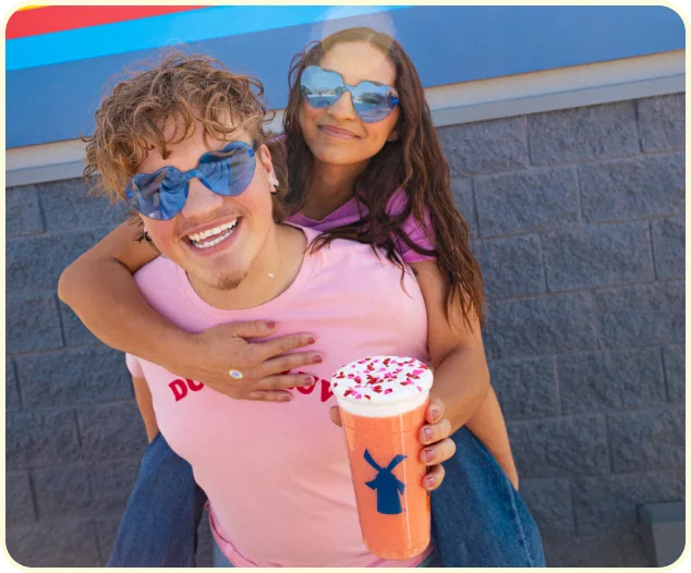 dutch broistas holding a drink